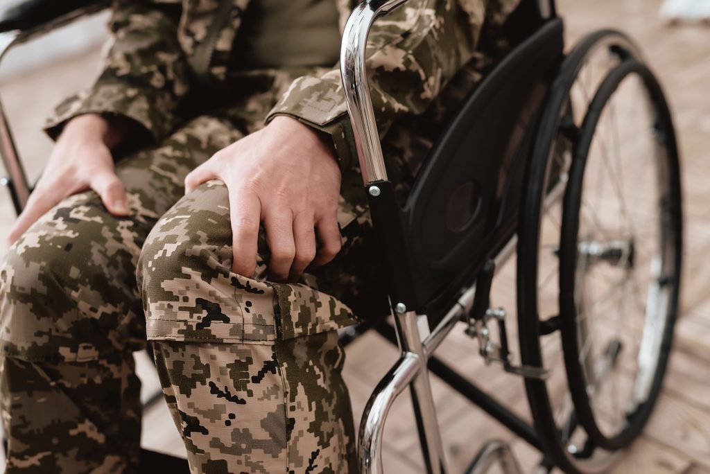 Army, Navy, Air Force Injury and Accident Compensation - Veteran in wheelchair